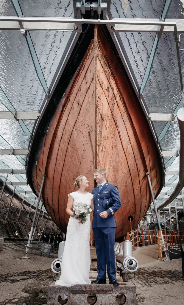 Wedding photo in front of a boat